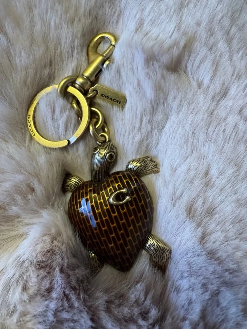 COACH Gold-Tone Turtle Heart Keychain with Brown Enamel